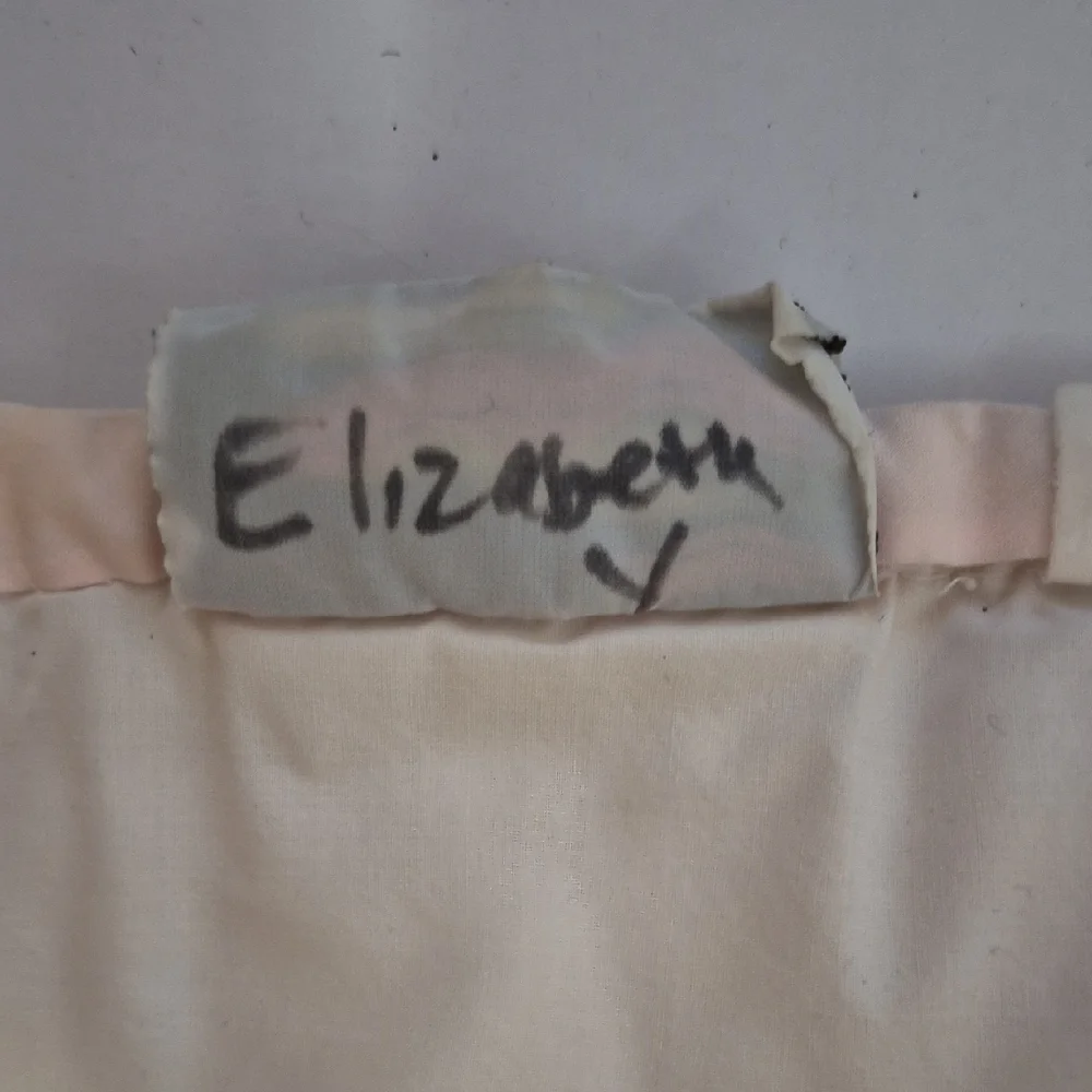 Pastel Embroidered Baby Quilt with Floral Accents